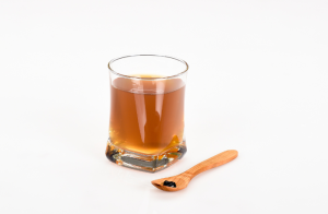 wooden spoon shilajit with glass 